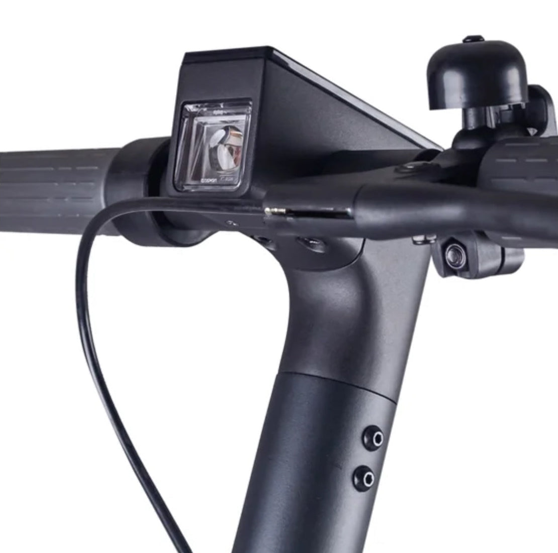 Close-up of a bicycle handlebar with control panel and bell on a white background